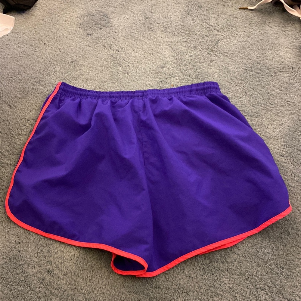 Pink and purple athletic shorts.